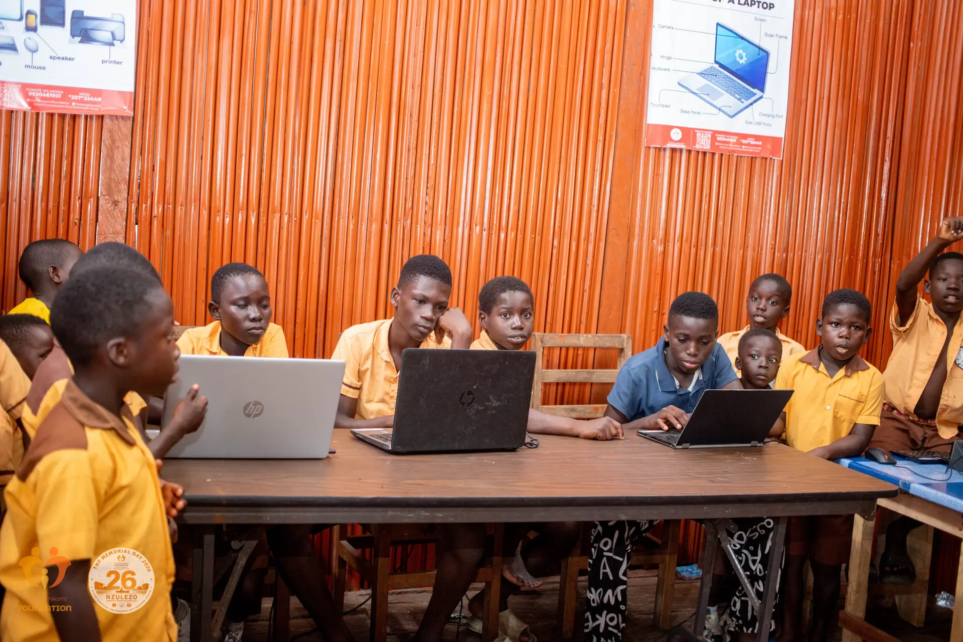 Students using laptops in the ICT lab at TNF Hub – Nzulezo during commissioning day.