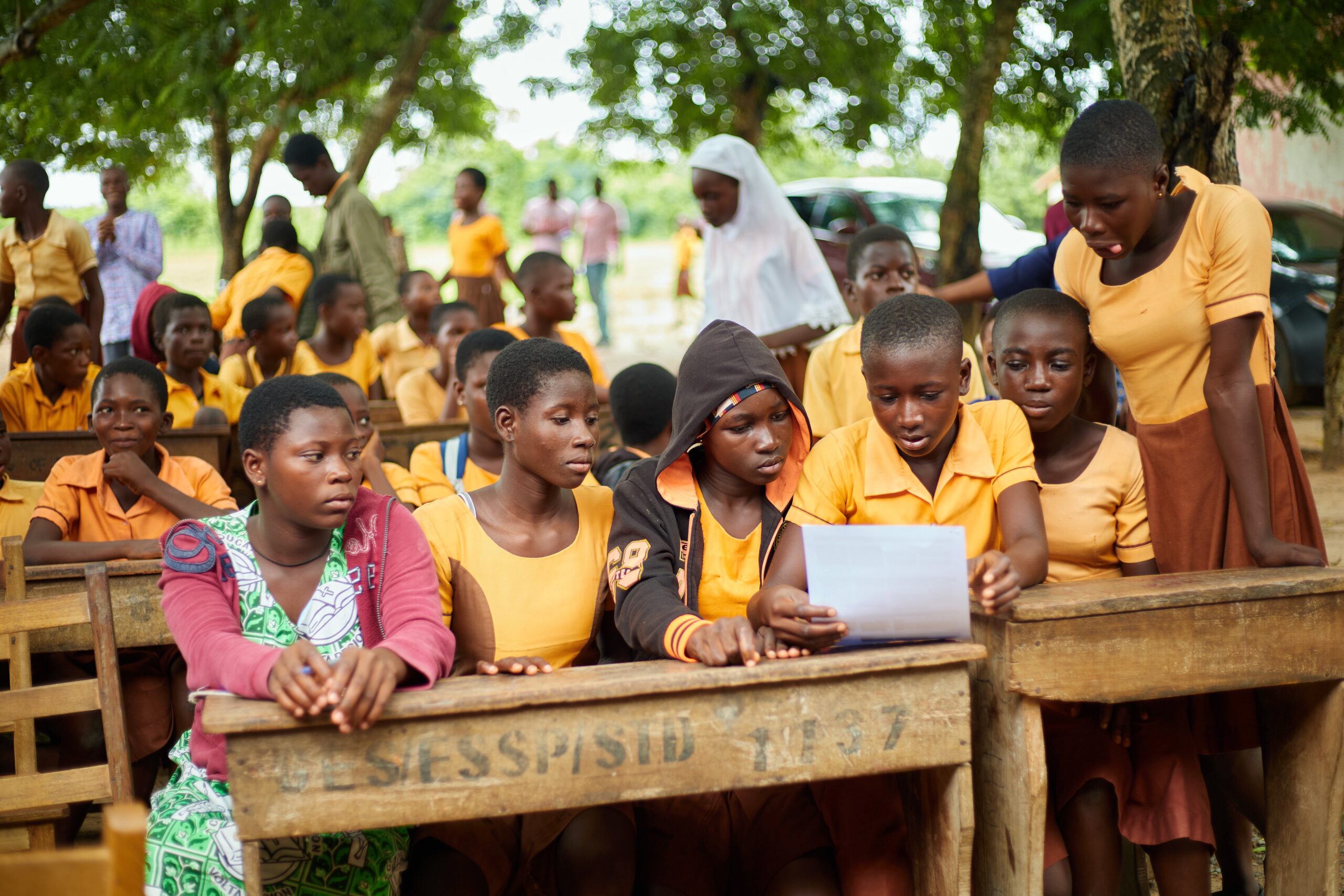 Girls reading together at the Lakpo Menstrual Hygiene Day programme