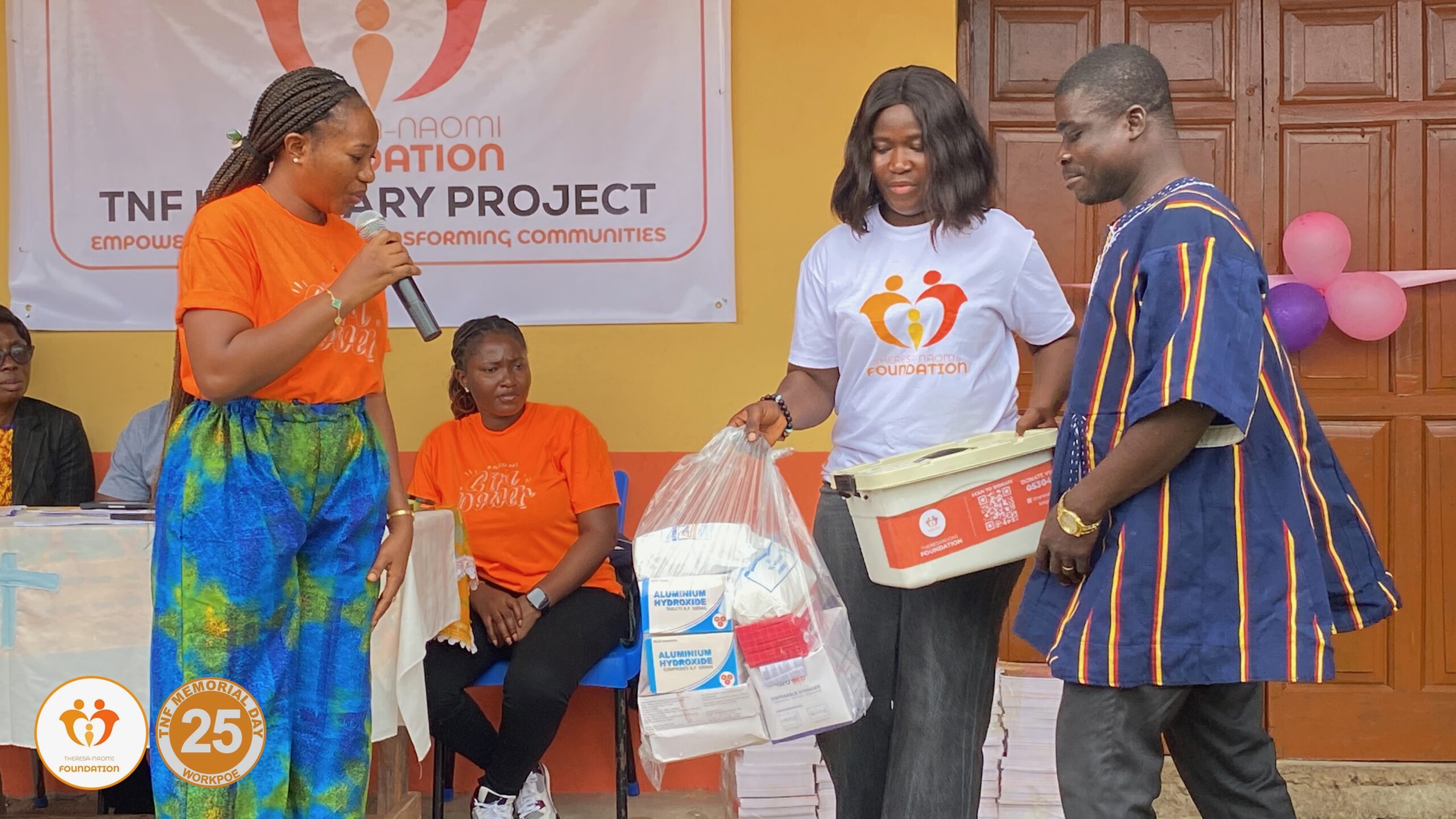 TNF volunteers presenting medical supplies during the Workpoe programme